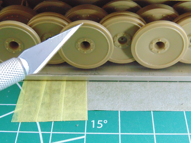 road wheel with pointer and tape