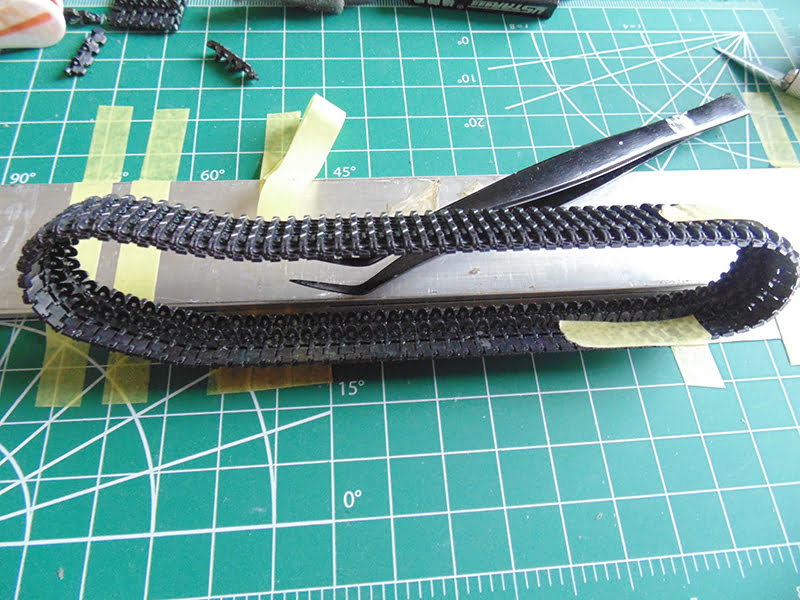 completed track with tape holding the break