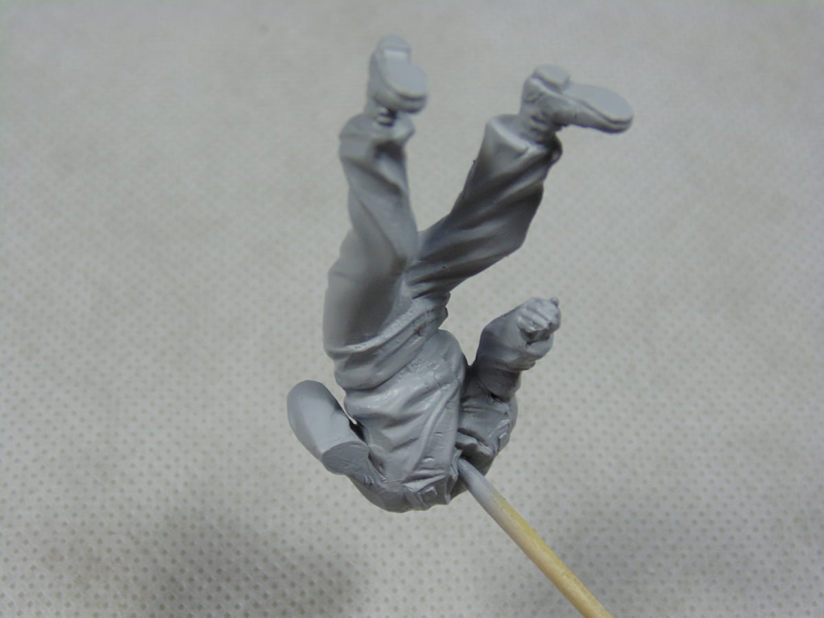 Primed Figure On A Stick