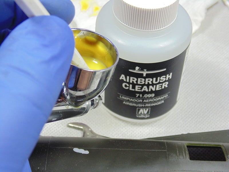 Airbrush Cleaner with White Brush in Cup