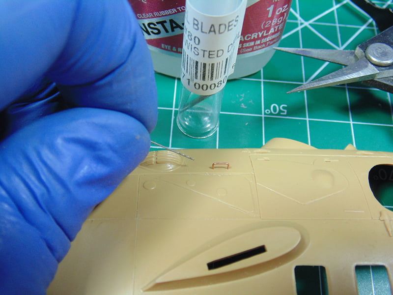 Glove with Drill Bit with Part and Grab Handle