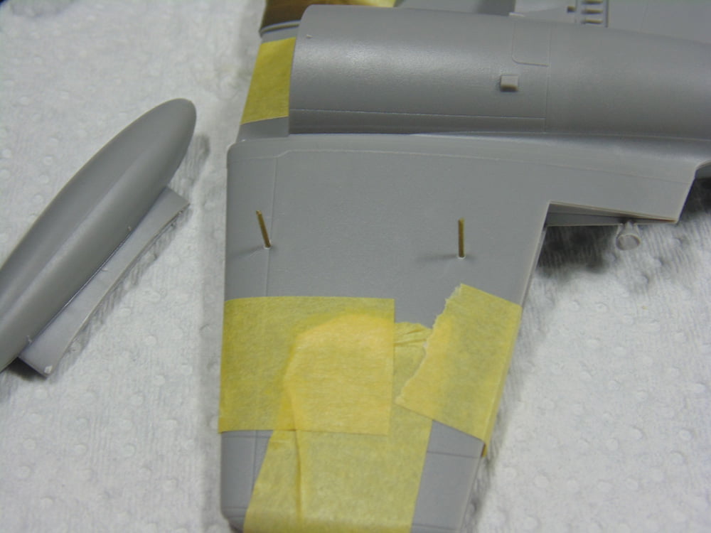 Tank with Wing Parts and Yellow Tamiya Tape