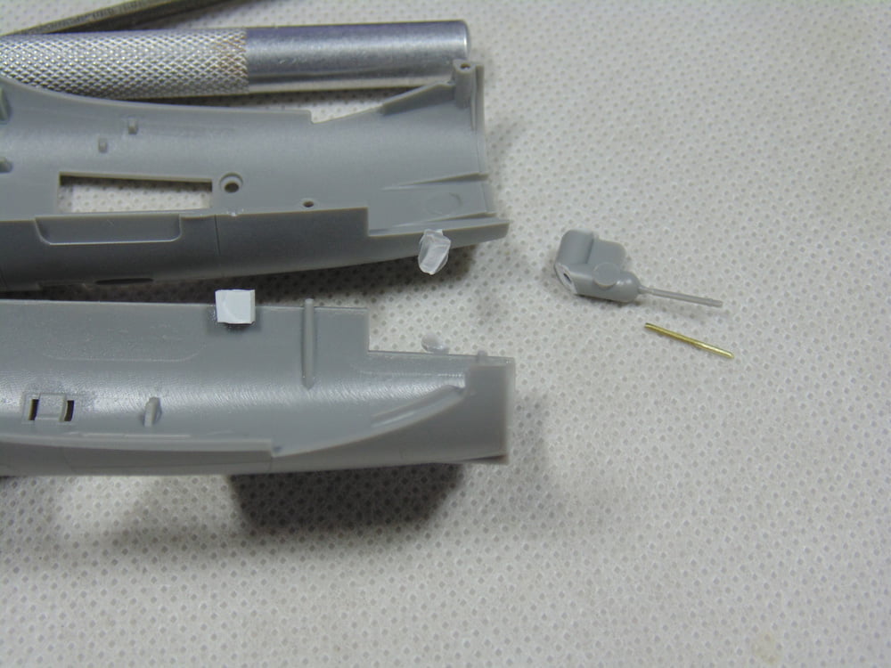 Fuselage Halves with White Square Plug and Parts