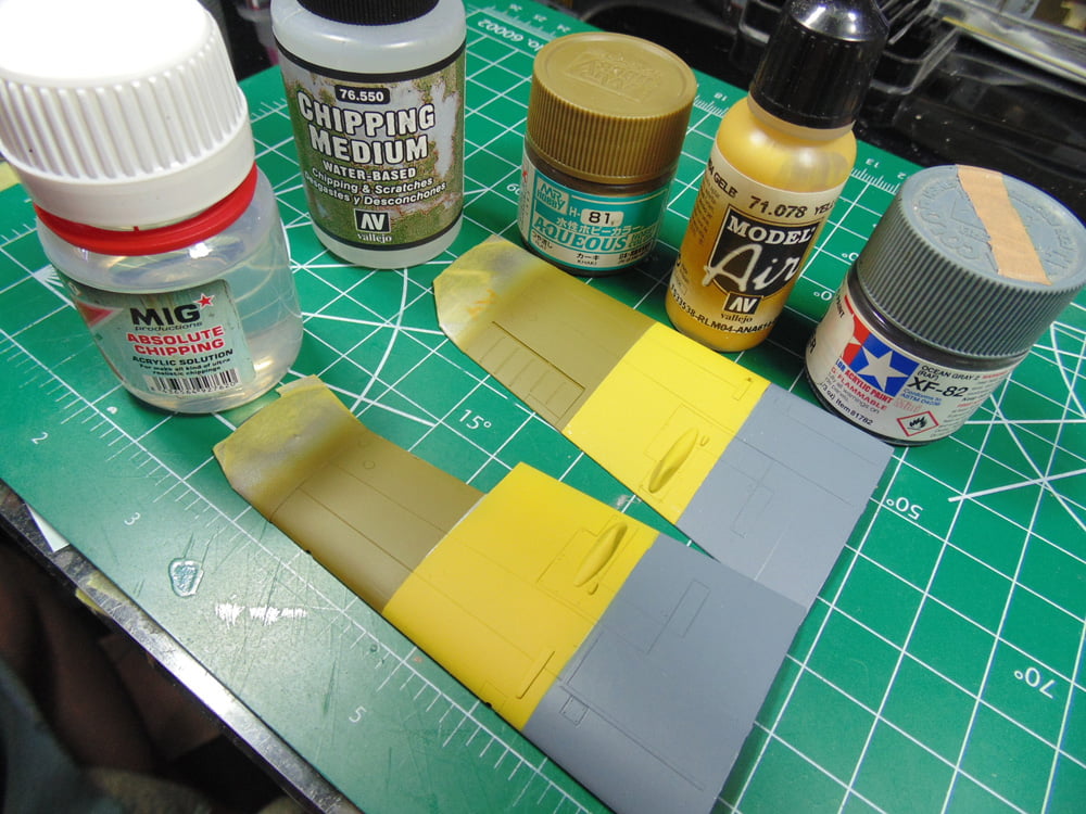 Two Differently Painted Wing Tops with Products