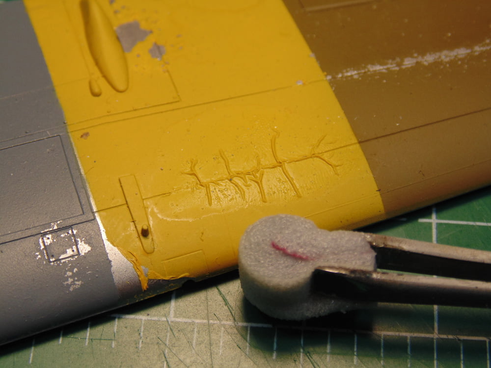 Wrinkled Yellow Paint with Tweezers