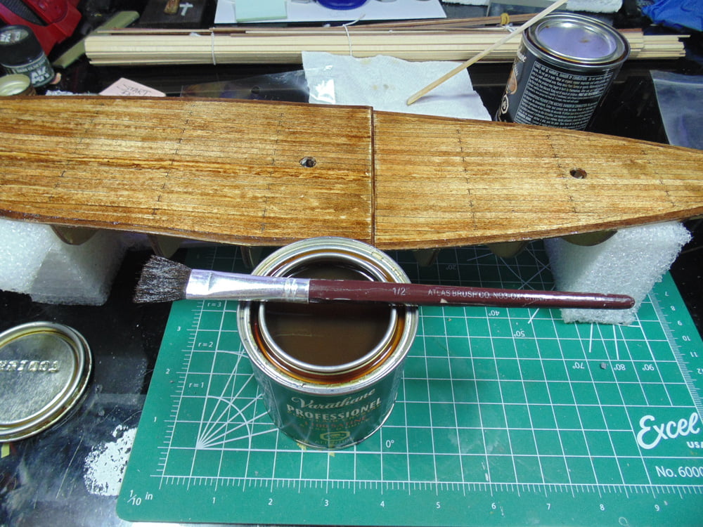 Deck with Can of Varnish and Wide Brush