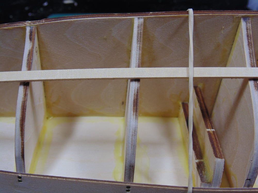 Strengtheners with Strip of Wood and Rubber Band