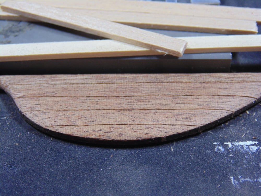 Completed Rudder Next to Photo Etch Bender and Slats