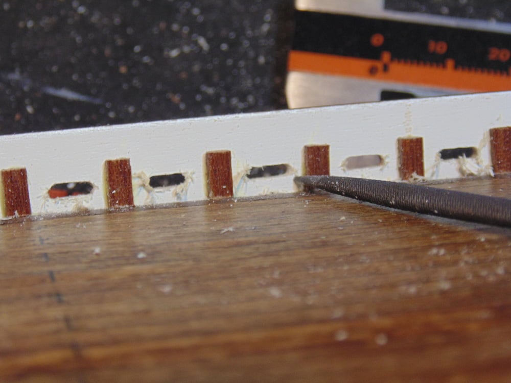 File Pointing at Wood Debris