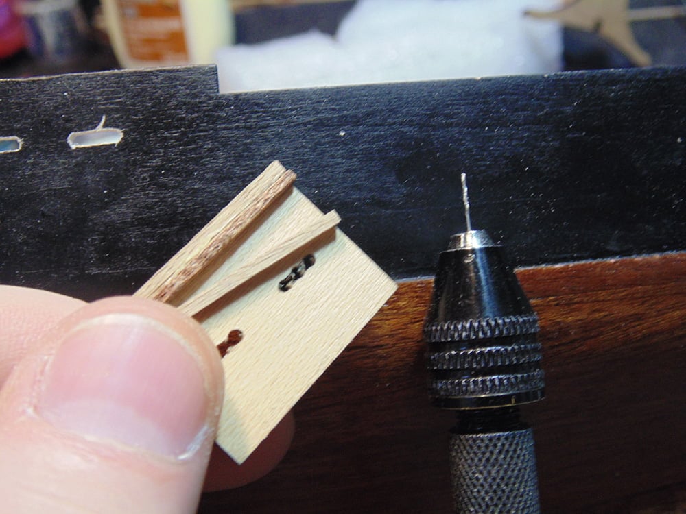 Holding the Template Below a Test Hole with Drill