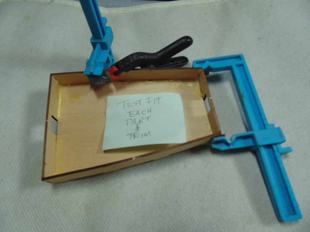 Note with Clamped Parts
