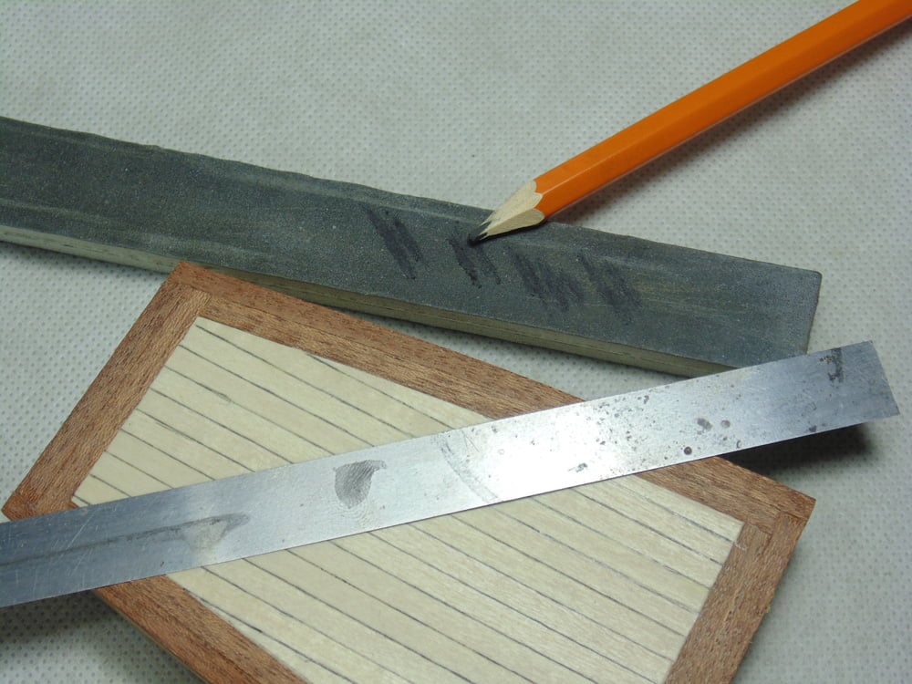 Pencil Sander and Part with Straight Edge