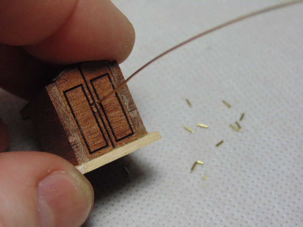 Part with wire and small made bits