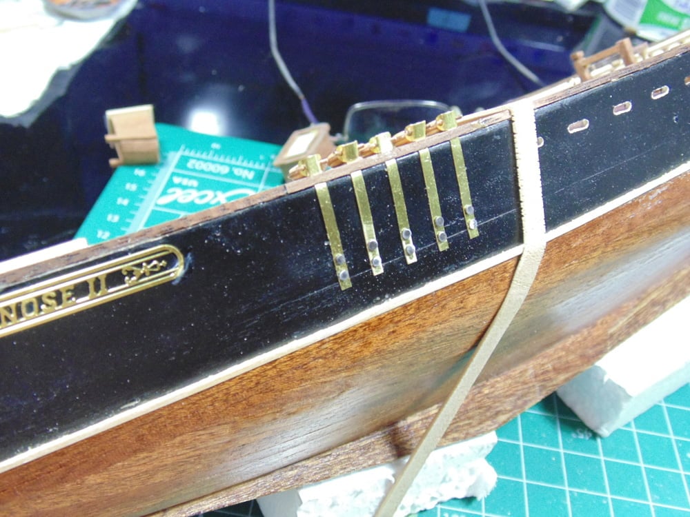 Port forward mast straps installed