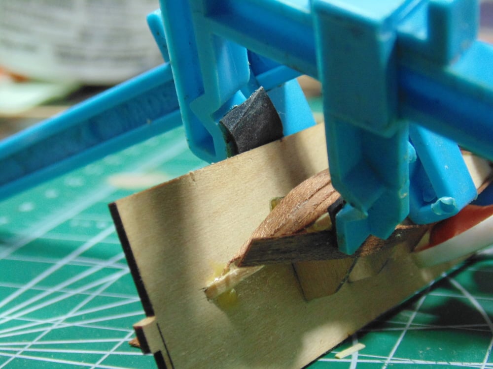 Blue Clamp at the Bow of Dory Hull