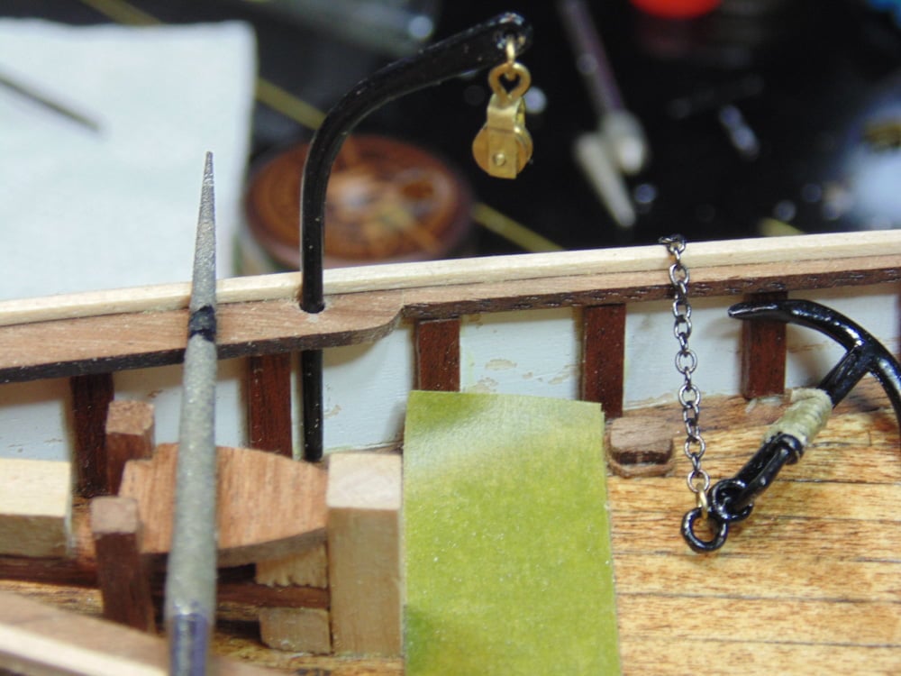 Reamer with Swing Arm and Anchor