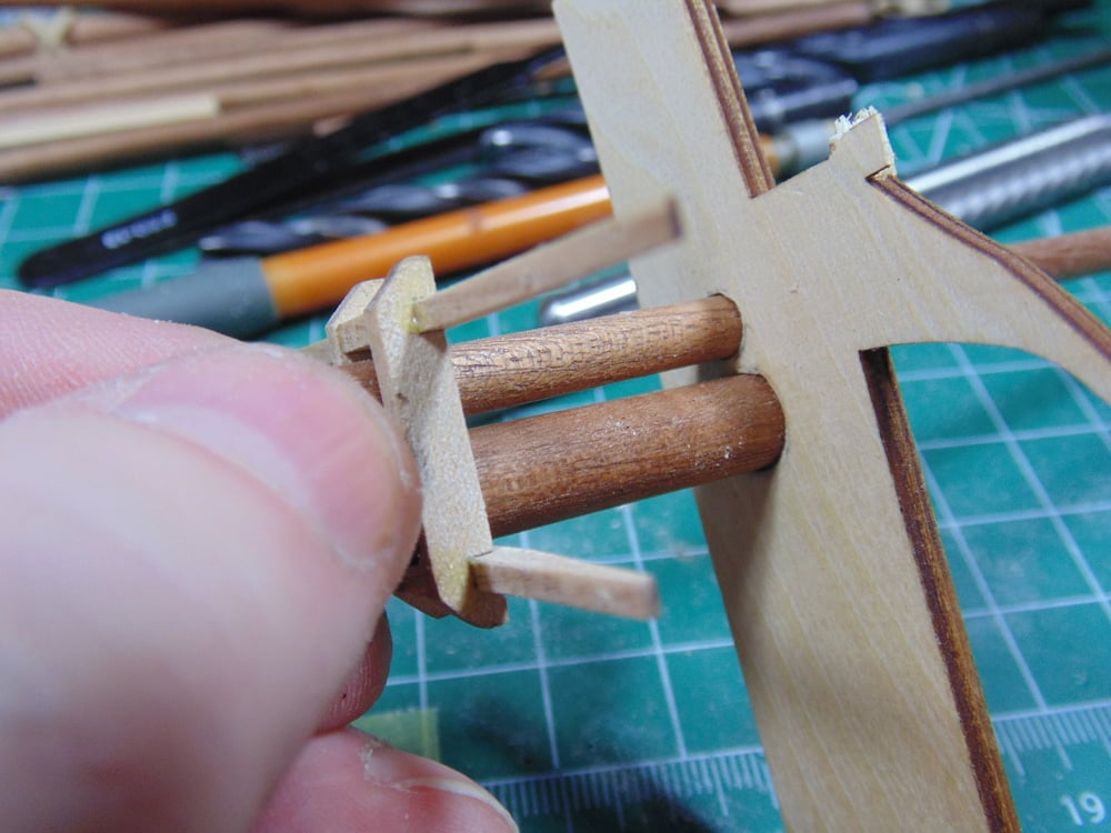 Mast tips on scrap wood sheet