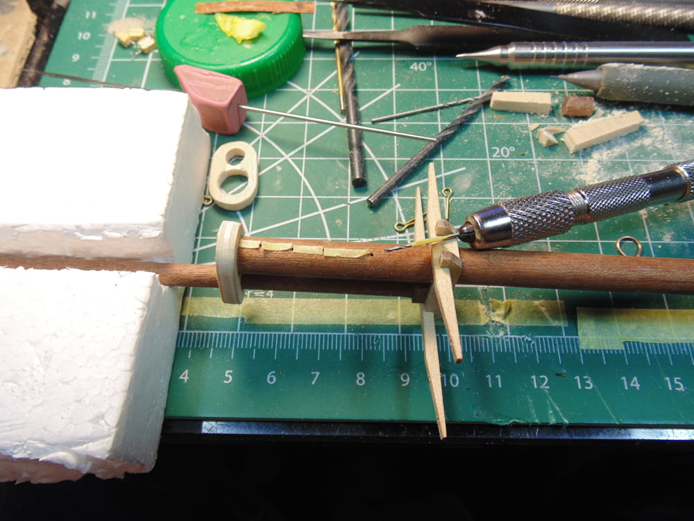 Main mast assembly with lengths of tape spacers