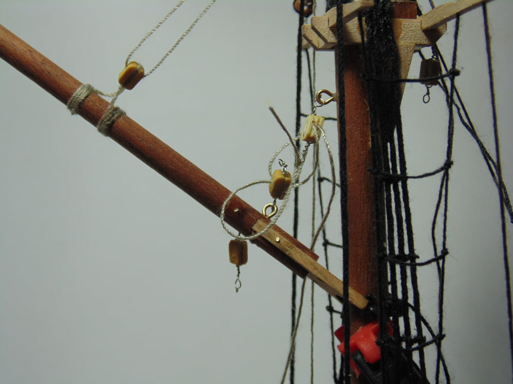 Lower jib support lines with red tipped clamp