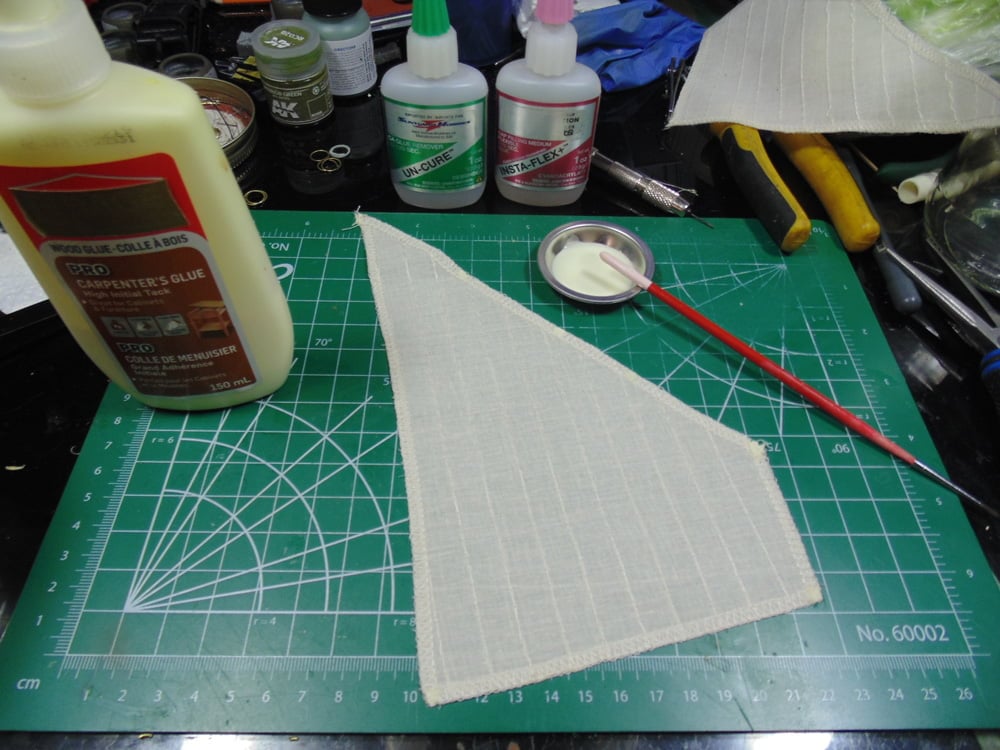 Storm sail prepared with glue