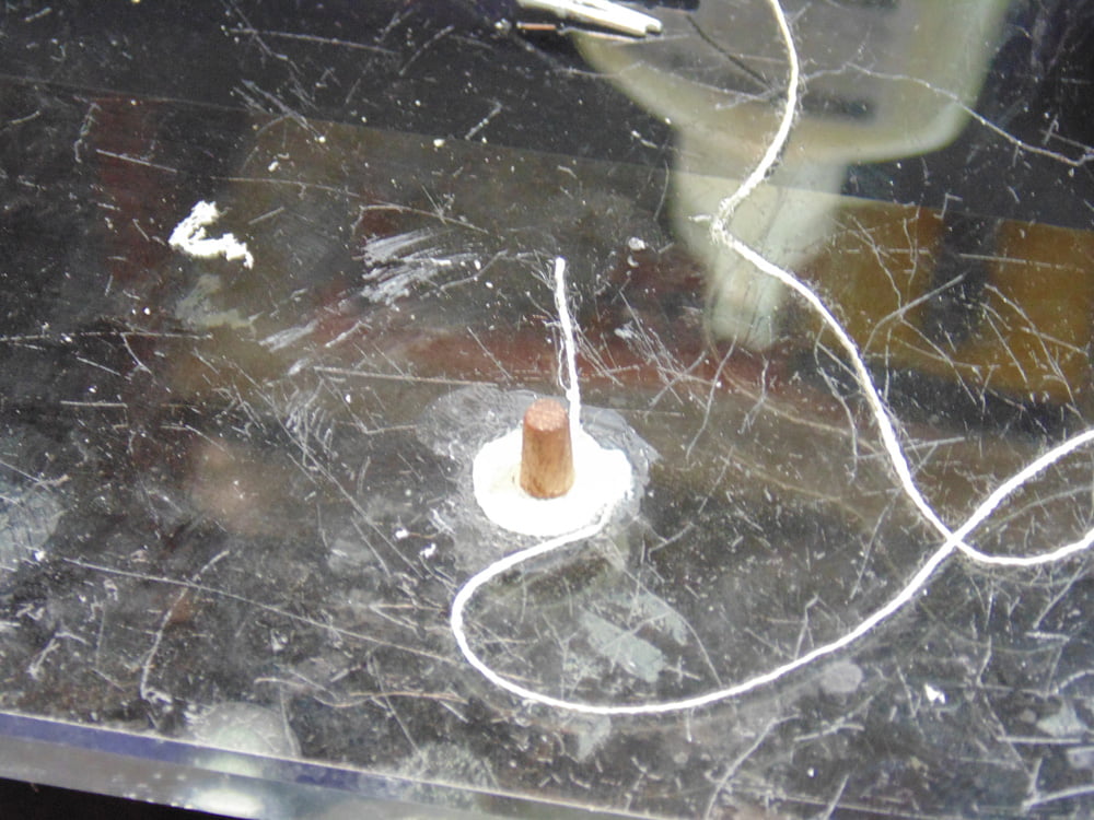 Rope spiral being made on glass surface