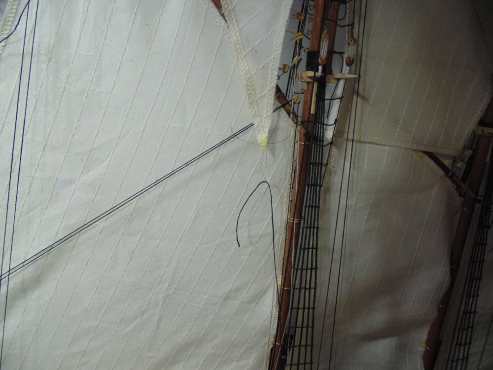 Copper wire in the lower corner of the storm sail