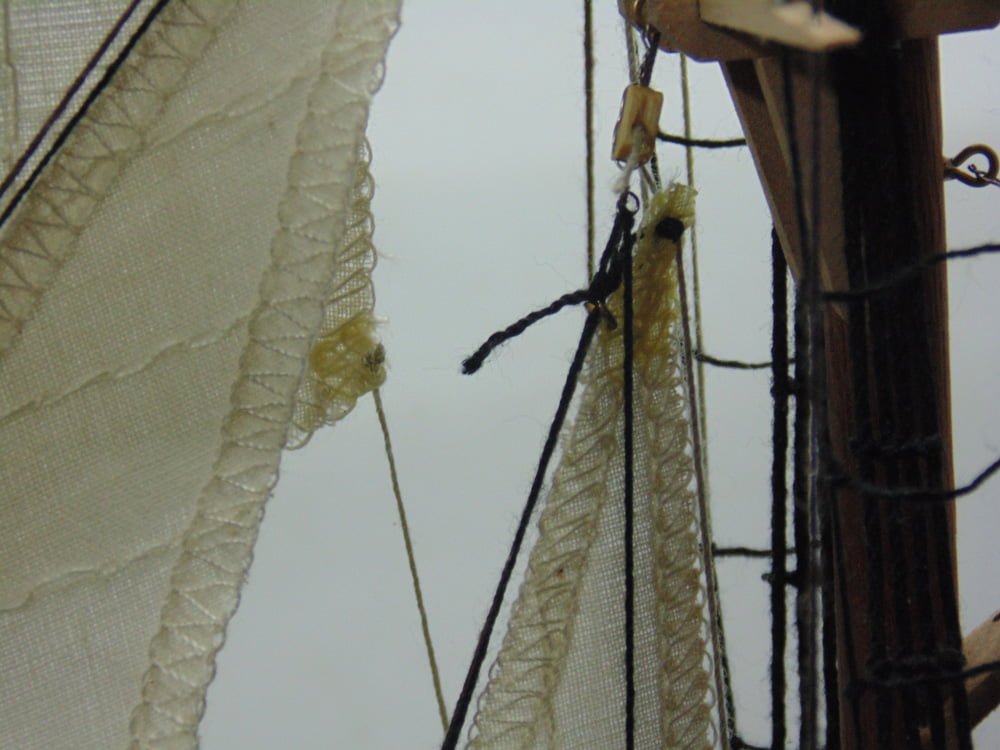 Close up of top corner of tri-sail