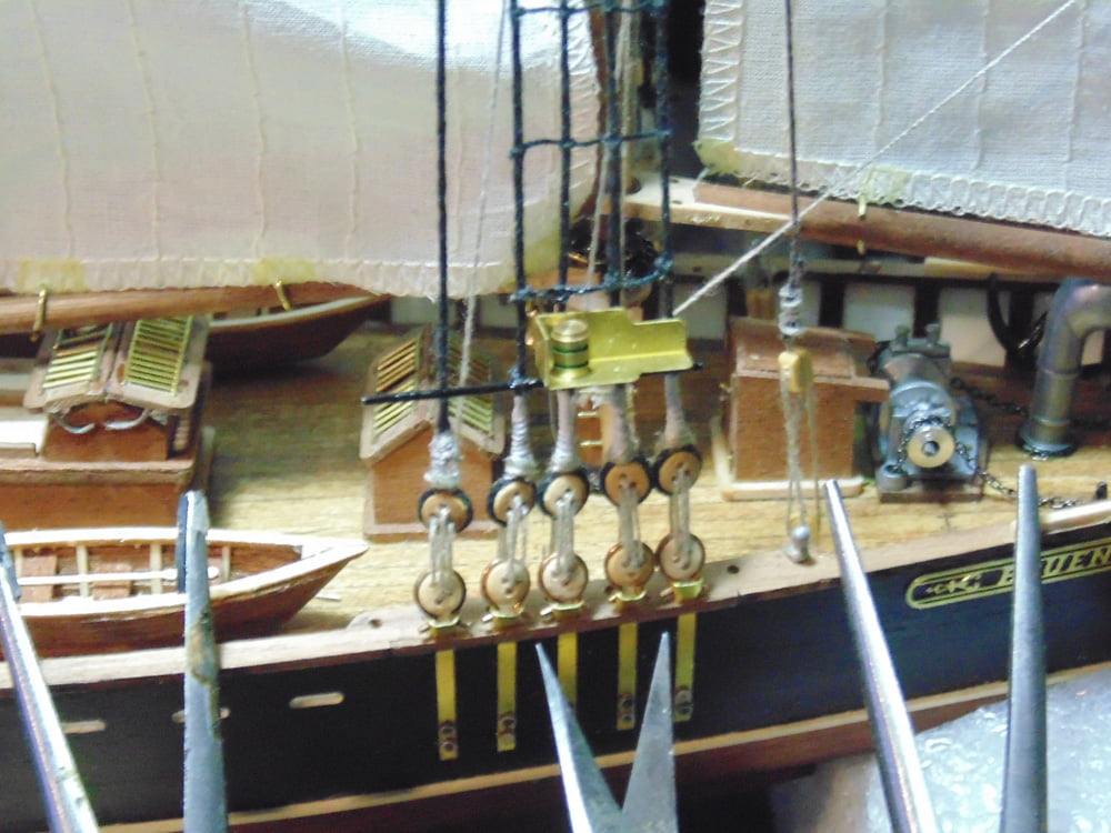 Pliers and wire snippers leaning on handrail