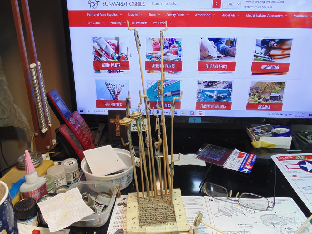 Sticks on holder with Sunward Hobbies web site