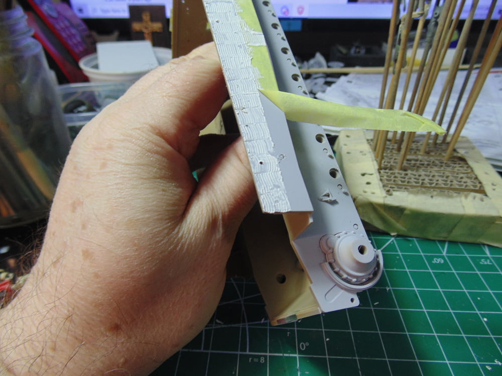Masking tape at a 45-degree angle away from the hull