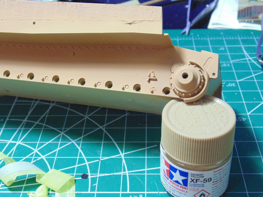 Tamiya paint jar holding up the lower hull