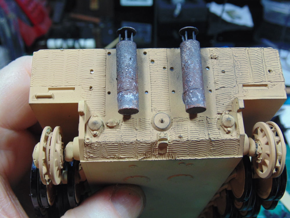 Exhausts attached with soot dry brushed on the Zimmerit