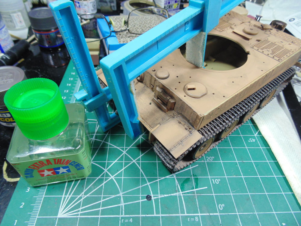 Tamiya cement next to clamped parts
