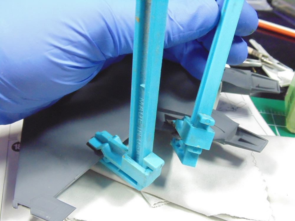 Clamps at left rear wing