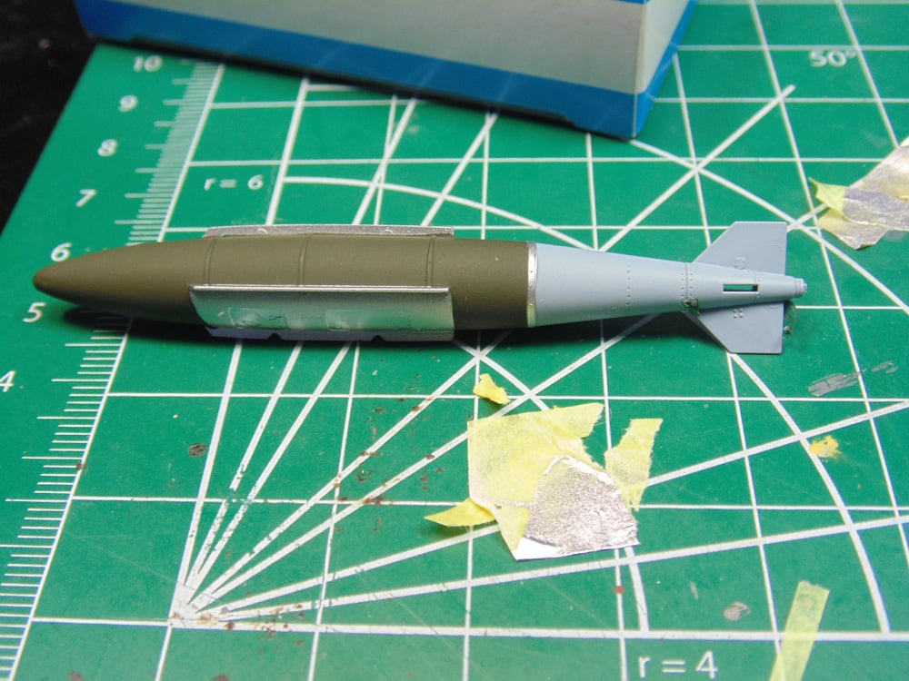 Masked removed from bomb with bit of tape below
