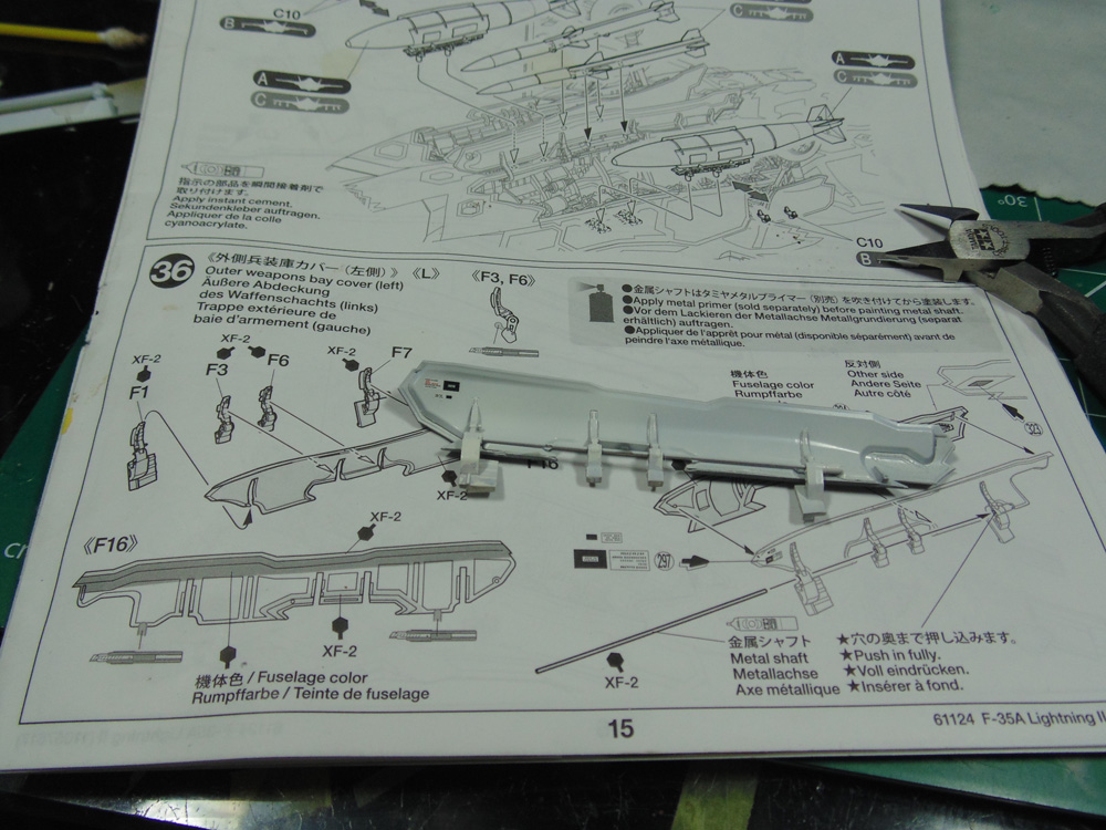 Left outer wall cover assembly being decaled