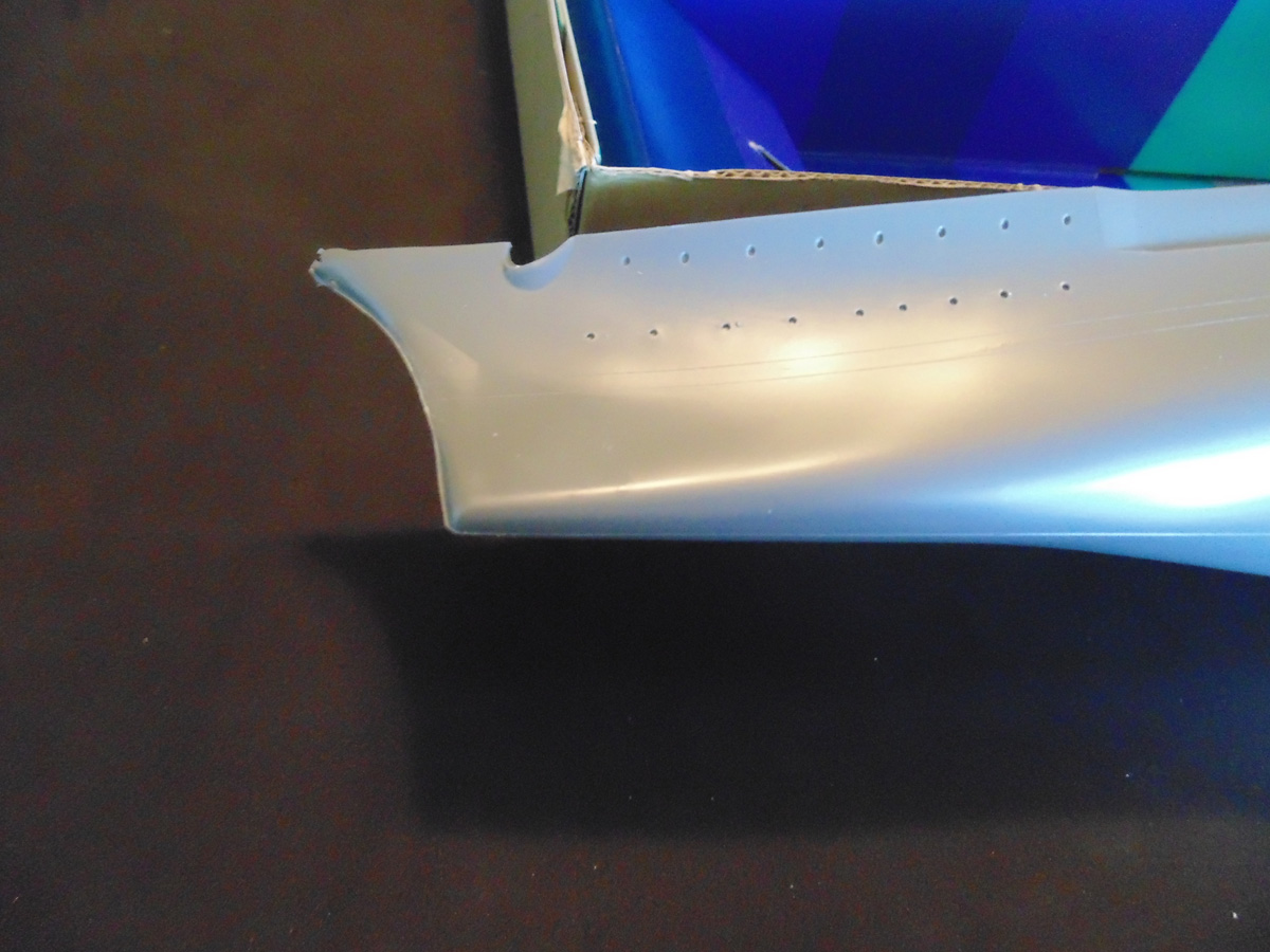 Bow showing the flash on the seam line and paint lines