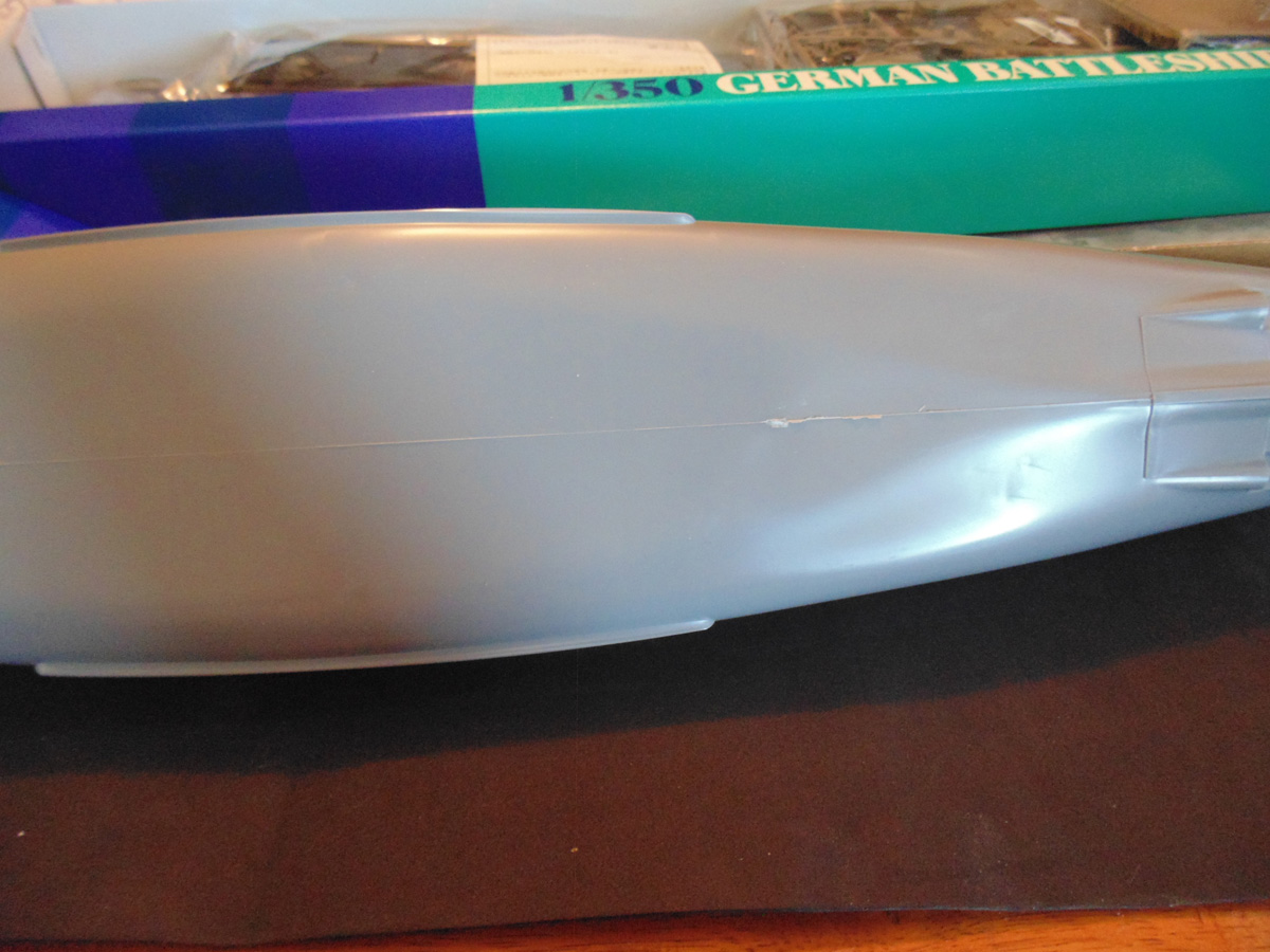 Mid lower hull part showing flash and marred release point