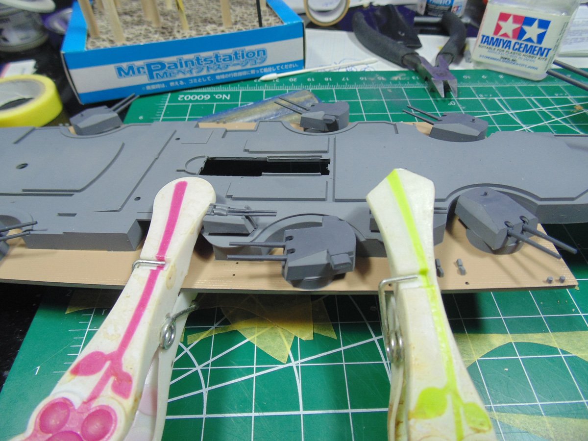 Clothes pins holding AA platform