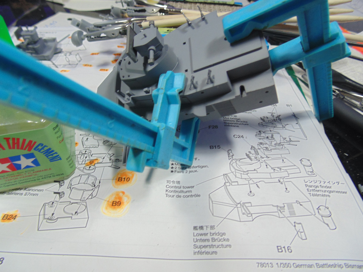 Blue clamps on the parts