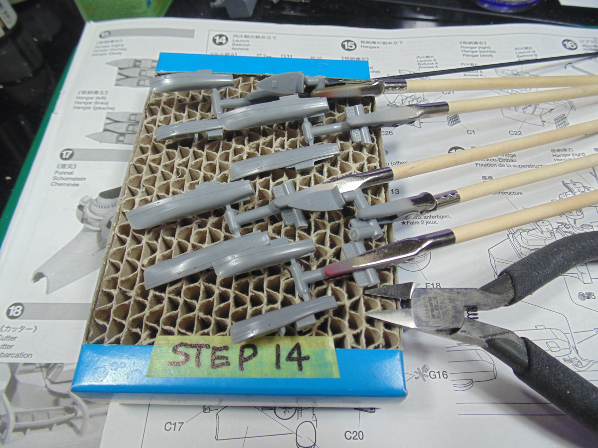 Launch boat parts in Step 14 on sticks with Tamiya side cutters