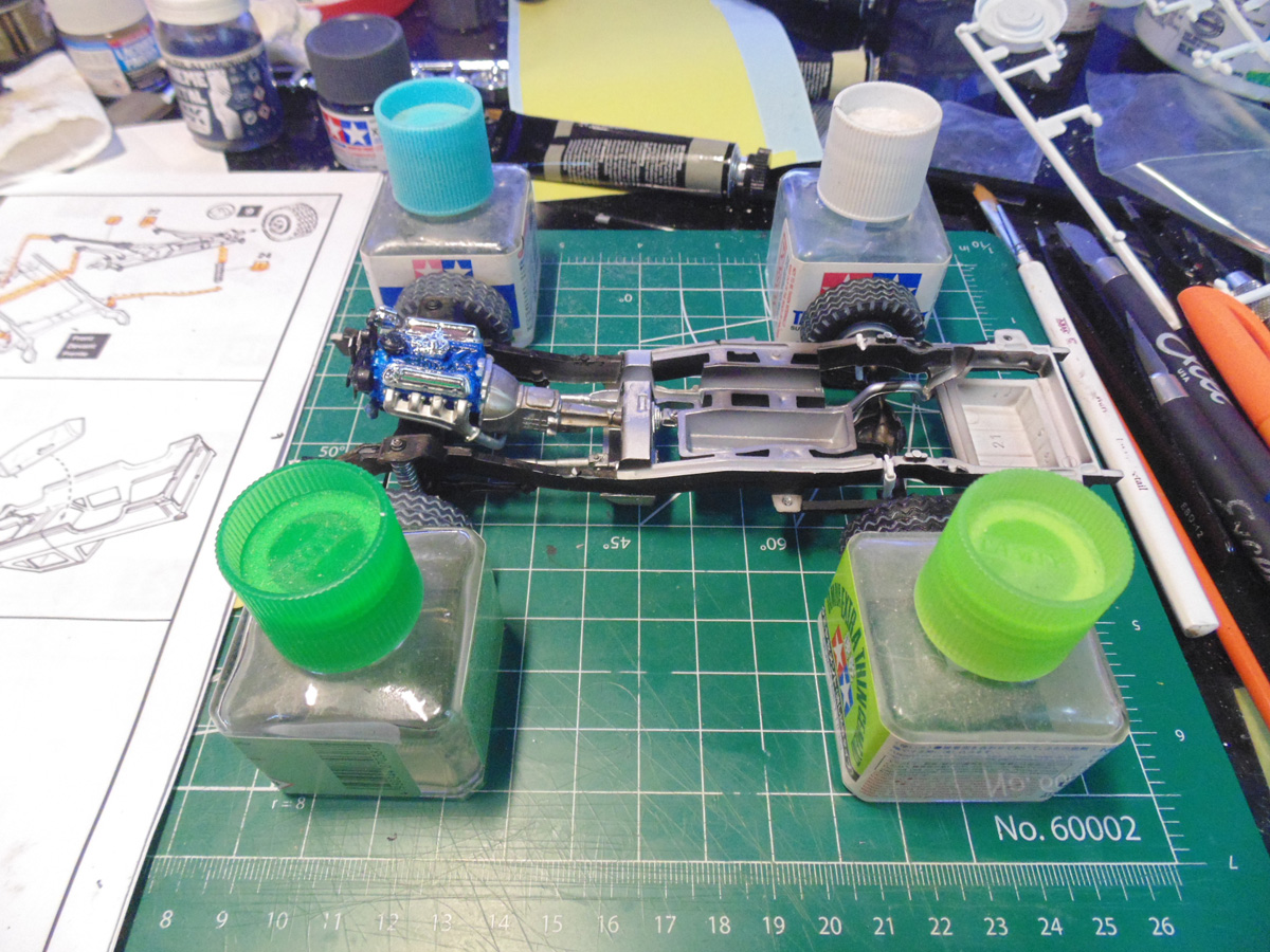 Four Tamiya jars at the wheel points