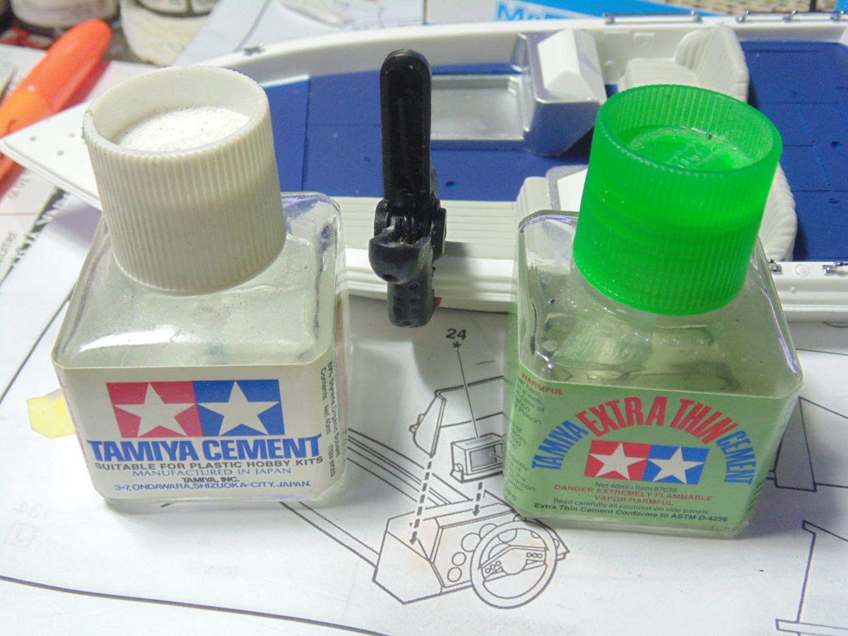 Two types of Tamiya product with a clamp between