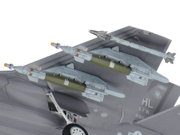 This model kit recreates the state-of-the-art F-35A Lightning II in 1/72 scale. It inherits many of the detailed features first seen in our 1/48 scale release. Thanks to extensive research, the A variant of the Lockheed Martin F-35 Lightning II is available to fans in either preferred scale. About the F-35A Fighter jets have continued to develop since they were first seen in late WWII, to the point where modern-day aircraft such as the F-35 Lightning II and F-22 Raptor are often called "fifth generation" fighters; qualities such as their highly advanced stealth characteristics and network connectivity set them apart from earlier fighters. Developed under the Joint Strike Fighter Program (JSF), the F-35 integrates multiple functions into its design and there are three types at the time of writing: the F-35A conventional take-off and landing (CTOL) aircraft, the F-35B short take-off, vertical landing (STOVL), and the F-35C, with its larger wing and tail; across these three variants, the F-35 can accomplish various missions without impacting upon its observability and exemplary maneuverability. Multiple sensors are at the heart of its advanced capabilities, and the wealth of data harvested is shared via multifunction advanced data link, helping provide the crew with outstanding information via a large cockpit display and the helmet-mounted display system. The F-35's maiden flight was in December 2006, and deployment with air arms in the U.S., Italy, Japan, and more is planned, as the aircraft appears set to take on a key role in the defense landscape in years to come. • 1/72 scale plastic model assembly kit. Wingspan: 148mm, fuselage length: 218mm. • Features refined molded depictions of radar absorbent material (RAM) sections on the surface. • This kit can be assembled with one choice of the three ordnance patterns – stealth mode, air-to-air mode, and beast mode. • Ordnance components can be attached to the weapons stations on the belly of the aircraft. • (Weapons bay door can only be attached closed.) • The fuselage with integrated wing has a realistic rendering of Blended Wing Body (BWB). • This kit also features realistic renderings of the following sections: - Y- shaped air intakes - Cockpit and landing gear bays - Engine nozzle (one-piece design) - Martin-Baker US16E ejection seat - RCS (radar cross section) enhancers affixed to top and bottom sections (two for each, four in total) during basic training exercises. - Boxes stored in nose landing gear bay. • Choose from open or closed canopy (not interchangeable after assembly). • Flaps are assembled in the up position. • Canopy and EOTS sensor fairing on nose undersurface are recreated in transparent plastic. • Includes a realistically recreated seated pilot figure with Helmet-Mounted Display (HMD) and ordnance components (AIM-9X Sidewinder x2 and GBU-12 Paveway II x4). • Comes with three marking options: • 34th FS, 388th FW, U.S. Air Force Air Combat Command, Hill AFB, Utah • 301st Fighter Squadron, 3rd Wing, Japan Air Self-Defense Force, Misawa Air Base 302nd Fighter Squadron, 3rd Wing, Japan Air Self-Defense Force, Misawa Air Base • Includes masking stickers for painting demarcation of canopy and EOTS sensor fairing components, and a full-color painting guide.