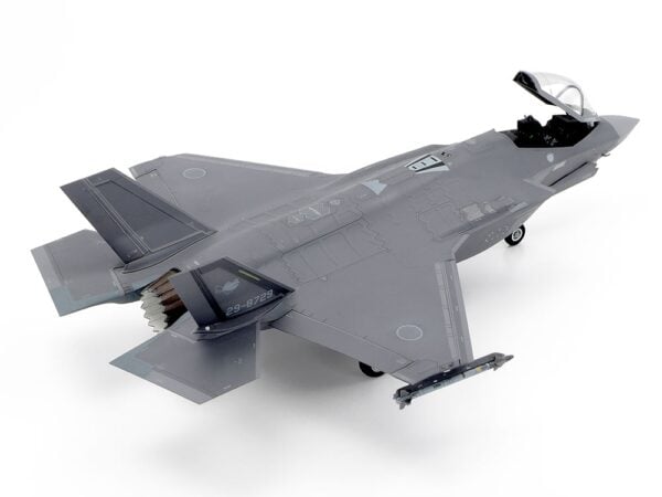 This model kit recreates the state-of-the-art F-35A Lightning II in 1/72 scale. It inherits many of the detailed features first seen in our 1/48 scale release. Thanks to extensive research, the A variant of the Lockheed Martin F-35 Lightning II is available to fans in either preferred scale. About the F-35A Fighter jets have continued to develop since they were first seen in late WWII, to the point where modern-day aircraft such as the F-35 Lightning II and F-22 Raptor are often called "fifth generation" fighters; qualities such as their highly advanced stealth characteristics and network connectivity set them apart from earlier fighters. Developed under the Joint Strike Fighter Program (JSF), the F-35 integrates multiple functions into its design and there are three types at the time of writing: the F-35A conventional take-off and landing (CTOL) aircraft, the F-35B short take-off, vertical landing (STOVL), and the F-35C, with its larger wing and tail; across these three variants, the F-35 can accomplish various missions without impacting upon its observability and exemplary maneuverability. Multiple sensors are at the heart of its advanced capabilities, and the wealth of data harvested is shared via multifunction advanced data link, helping provide the crew with outstanding information via a large cockpit display and the helmet-mounted display system. The F-35's maiden flight was in December 2006, and deployment with air arms in the U.S., Italy, Japan, and more is planned, as the aircraft appears set to take on a key role in the defense landscape in years to come. • 1/72 scale plastic model assembly kit. Wingspan: 148mm, fuselage length: 218mm. • Features refined molded depictions of radar absorbent material (RAM) sections on the surface. • This kit can be assembled with one choice of the three ordnance patterns – stealth mode, air-to-air mode, and beast mode. • Ordnance components can be attached to the weapons stations on the belly of the aircraft. • (Weapons bay door can only be attached closed.) • The fuselage with integrated wing has a realistic rendering of Blended Wing Body (BWB). • This kit also features realistic renderings of the following sections: - Y- shaped air intakes - Cockpit and landing gear bays - Engine nozzle (one-piece design) - Martin-Baker US16E ejection seat - RCS (radar cross section) enhancers affixed to top and bottom sections (two for each, four in total) during basic training exercises. - Boxes stored in nose landing gear bay. • Choose from open or closed canopy (not interchangeable after assembly). • Flaps are assembled in the up position. • Canopy and EOTS sensor fairing on nose undersurface are recreated in transparent plastic. • Includes a realistically recreated seated pilot figure with Helmet-Mounted Display (HMD) and ordnance components (AIM-9X Sidewinder x2 and GBU-12 Paveway II x4). • Comes with three marking options: • 34th FS, 388th FW, U.S. Air Force Air Combat Command, Hill AFB, Utah • 301st Fighter Squadron, 3rd Wing, Japan Air Self-Defense Force, Misawa Air Base 302nd Fighter Squadron, 3rd Wing, Japan Air Self-Defense Force, Misawa Air Base • Includes masking stickers for painting demarcation of canopy and EOTS sensor fairing components, and a full-color painting guide.