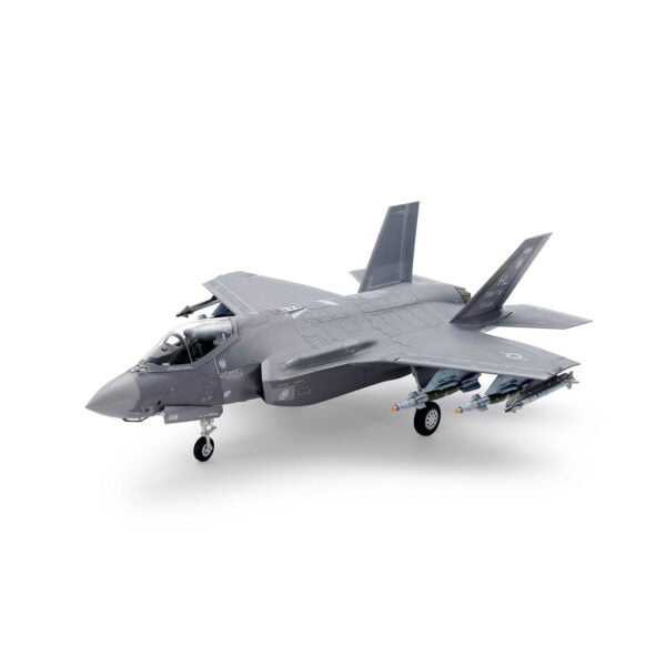 This model kit recreates the state-of-the-art F-35A Lightning II in 1/72 scale. It inherits many of the detailed features first seen in our 1/48 scale release. Thanks to extensive research, the A variant of the Lockheed Martin F-35 Lightning II is available to fans in either preferred scale. About the F-35A Fighter jets have continued to develop since they were first seen in late WWII, to the point where modern-day aircraft such as the F-35 Lightning II and F-22 Raptor are often called "fifth generation" fighters; qualities such as their highly advanced stealth characteristics and network connectivity set them apart from earlier fighters. Developed under the Joint Strike Fighter Program (JSF), the F-35 integrates multiple functions into its design and there are three types at the time of writing: the F-35A conventional take-off and landing (CTOL) aircraft, the F-35B short take-off, vertical landing (STOVL), and the F-35C, with its larger wing and tail; across these three variants, the F-35 can accomplish various missions without impacting upon its observability and exemplary maneuverability. Multiple sensors are at the heart of its advanced capabilities, and the wealth of data harvested is shared via multifunction advanced data link, helping provide the crew with outstanding information via a large cockpit display and the helmet-mounted display system. The F-35's maiden flight was in December 2006, and deployment with air arms in the U.S., Italy, Japan, and more is planned, as the aircraft appears set to take on a key role in the defense landscape in years to come. • 1/72 scale plastic model assembly kit. Wingspan: 148mm, fuselage length: 218mm. • Features refined molded depictions of radar absorbent material (RAM) sections on the surface. • This kit can be assembled with one choice of the three ordnance patterns – stealth mode, air-to-air mode, and beast mode. • Ordnance components can be attached to the weapons stations on the belly of the aircraft. • (Weapons bay door can only be attached closed.) • The fuselage with integrated wing has a realistic rendering of Blended Wing Body (BWB). • This kit also features realistic renderings of the following sections: - Y- shaped air intakes - Cockpit and landing gear bays - Engine nozzle (one-piece design) - Martin-Baker US16E ejection seat - RCS (radar cross section) enhancers affixed to top and bottom sections (two for each, four in total) during basic training exercises. - Boxes stored in nose landing gear bay. • Choose from open or closed canopy (not interchangeable after assembly). • Flaps are assembled in the up position. • Canopy and EOTS sensor fairing on nose undersurface are recreated in transparent plastic. • Includes a realistically recreated seated pilot figure with Helmet-Mounted Display (HMD) and ordnance components (AIM-9X Sidewinder x2 and GBU-12 Paveway II x4). • Comes with three marking options: • 34th FS, 388th FW, U.S. Air Force Air Combat Command, Hill AFB, Utah • 301st Fighter Squadron, 3rd Wing, Japan Air Self-Defense Force, Misawa Air Base 302nd Fighter Squadron, 3rd Wing, Japan Air Self-Defense Force, Misawa Air Base • Includes masking stickers for painting demarcation of canopy and EOTS sensor fairing components, and a full-color painting guide.