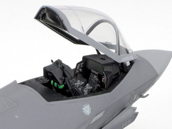 This model kit recreates the state-of-the-art F-35A Lightning II in 1/72 scale. It inherits many of the detailed features first seen in our 1/48 scale release. Thanks to extensive research, the A variant of the Lockheed Martin F-35 Lightning II is available to fans in either preferred scale. About the F-35A Fighter jets have continued to develop since they were first seen in late WWII, to the point where modern-day aircraft such as the F-35 Lightning II and F-22 Raptor are often called "fifth generation" fighters; qualities such as their highly advanced stealth characteristics and network connectivity set them apart from earlier fighters. Developed under the Joint Strike Fighter Program (JSF), the F-35 integrates multiple functions into its design and there are three types at the time of writing: the F-35A conventional take-off and landing (CTOL) aircraft, the F-35B short take-off, vertical landing (STOVL), and the F-35C, with its larger wing and tail; across these three variants, the F-35 can accomplish various missions without impacting upon its observability and exemplary maneuverability. Multiple sensors are at the heart of its advanced capabilities, and the wealth of data harvested is shared via multifunction advanced data link, helping provide the crew with outstanding information via a large cockpit display and the helmet-mounted display system. The F-35's maiden flight was in December 2006, and deployment with air arms in the U.S., Italy, Japan, and more is planned, as the aircraft appears set to take on a key role in the defense landscape in years to come. • 1/72 scale plastic model assembly kit. Wingspan: 148mm, fuselage length: 218mm. • Features refined molded depictions of radar absorbent material (RAM) sections on the surface. • This kit can be assembled with one choice of the three ordnance patterns – stealth mode, air-to-air mode, and beast mode. • Ordnance components can be attached to the weapons stations on the belly of the aircraft. • (Weapons bay door can only be attached closed.) • The fuselage with integrated wing has a realistic rendering of Blended Wing Body (BWB). • This kit also features realistic renderings of the following sections: - Y- shaped air intakes - Cockpit and landing gear bays - Engine nozzle (one-piece design) - Martin-Baker US16E ejection seat - RCS (radar cross section) enhancers affixed to top and bottom sections (two for each, four in total) during basic training exercises. - Boxes stored in nose landing gear bay. • Choose from open or closed canopy (not interchangeable after assembly). • Flaps are assembled in the up position. • Canopy and EOTS sensor fairing on nose undersurface are recreated in transparent plastic. • Includes a realistically recreated seated pilot figure with Helmet-Mounted Display (HMD) and ordnance components (AIM-9X Sidewinder x2 and GBU-12 Paveway II x4). • Comes with three marking options: • 34th FS, 388th FW, U.S. Air Force Air Combat Command, Hill AFB, Utah • 301st Fighter Squadron, 3rd Wing, Japan Air Self-Defense Force, Misawa Air Base 302nd Fighter Squadron, 3rd Wing, Japan Air Self-Defense Force, Misawa Air Base • Includes masking stickers for painting demarcation of canopy and EOTS sensor fairing components, and a full-color painting guide.