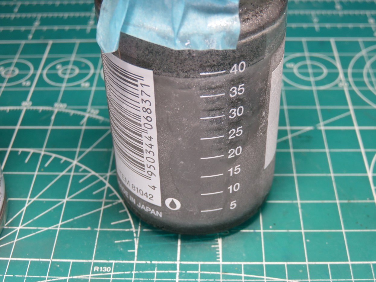 Decanted Paint in Jar