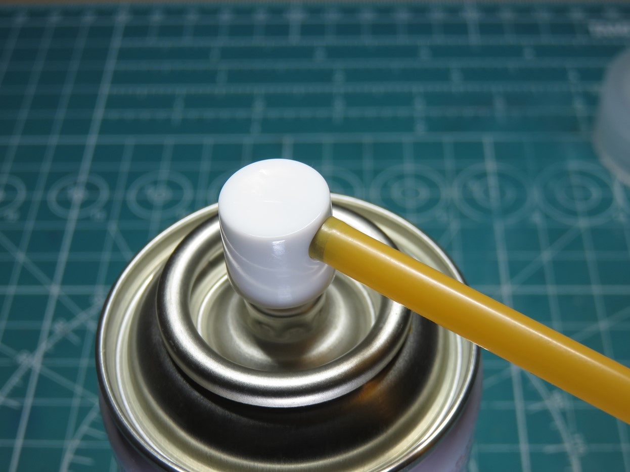 Inserting Straw in Nozzle