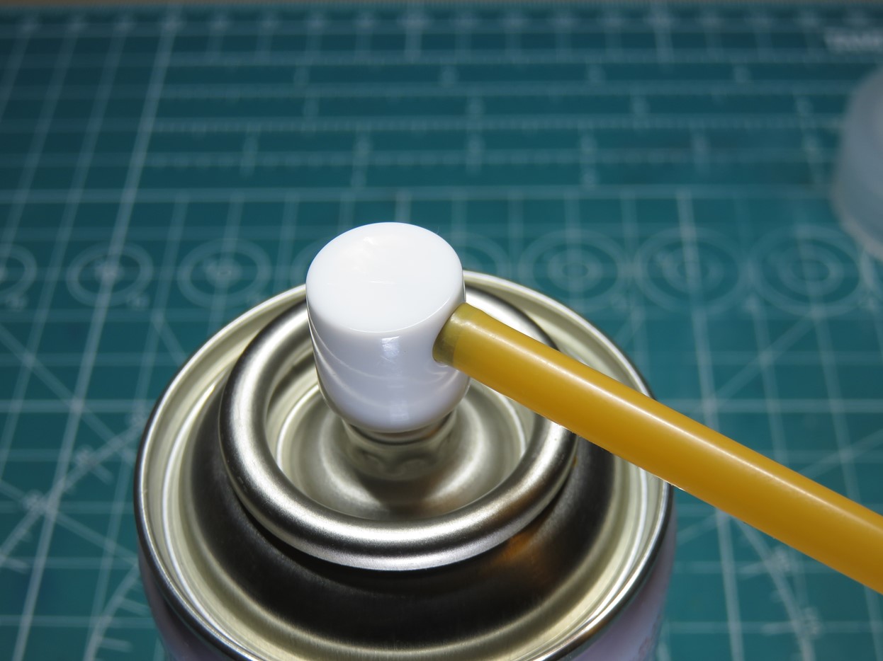 Inserting Straw in Nozzle